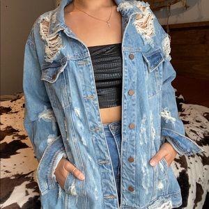 Very distressed jean jacket